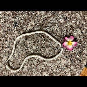 white and pink necklace